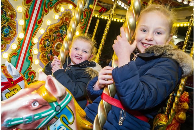 Children enjoying the fairground rides at Victorian Evening. Photo by Mike Baker