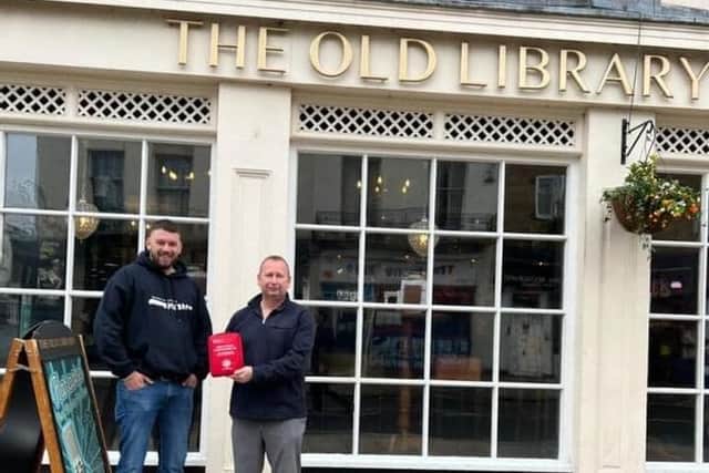 Benjamin Spann of the Change Your Life Put Down Your Knife campaign delivers one of the bleed kits to the Old Library pub in Leamington.
