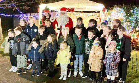 Families meet Father Christmas at the lights switch-on. Picture: Vicky Michael.