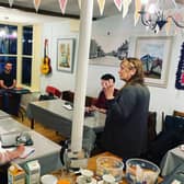 Artistic director Kate Saffin discusses the script for the show with the Braunston Writers Group which she runs, at a meeting in the village's community cafe.