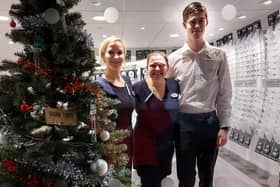 Staff Specsavers in The Square, Kenilworth, are appealing for donations to the Warwick District Food Bank. Picture supplied.