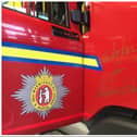 A person has died in a house fire in Warwickshire this afternoon.