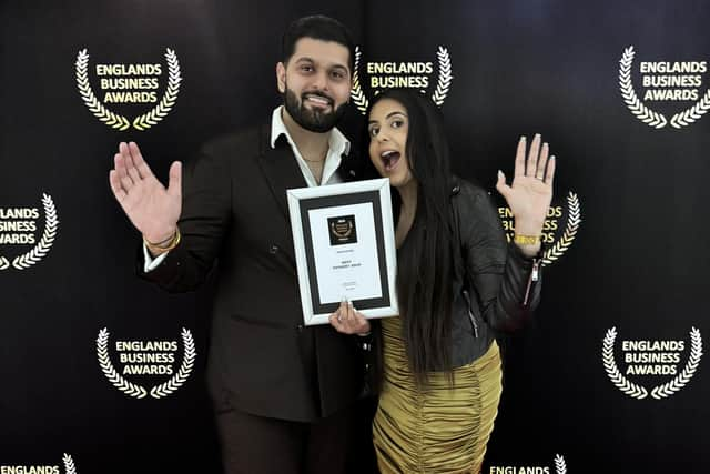 Husband and wife duo Harkeet and Karina Jhitta of Heavenly Desserts in Leamington receive the award for Best Dessert Franchise in the Warwickshire region at England’s Business Awards.