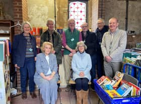 Volunteers in the bookshop at Baddesley Clinton . Credit: ©Alex Bunn