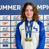 Annabel Crees with her British Swimming Summer Championships medals.