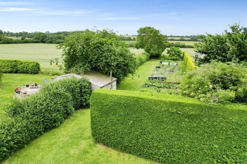 The property is set in more than an acres of grounds. Photo by Complete Estate Agents