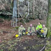 Watch the moment a stranded dog gets rescued from a cliff