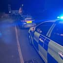 Police stop the driver, who was swerving on the road.