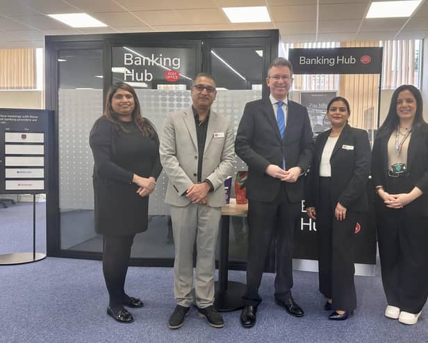 Sir Jeremy Wright MP with staff at the new temporary Banking Hub at Kenilworth Library. Picture supplied.