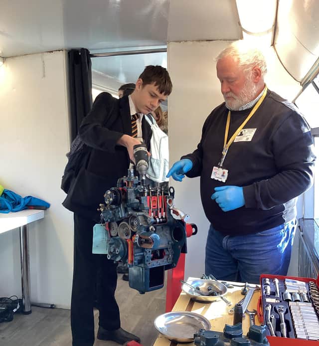 Students learn from different representatives at the careers day.