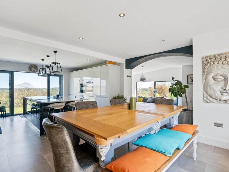 The open plan kitchen/dining room. Photo by DM & Co. Homes