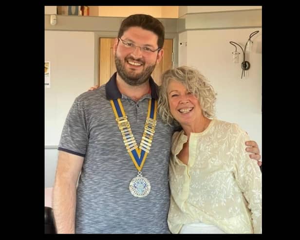 Leamington Rotary Club president Ataberk Keskisoglu with outgoing president Linda John. Picture supplied.