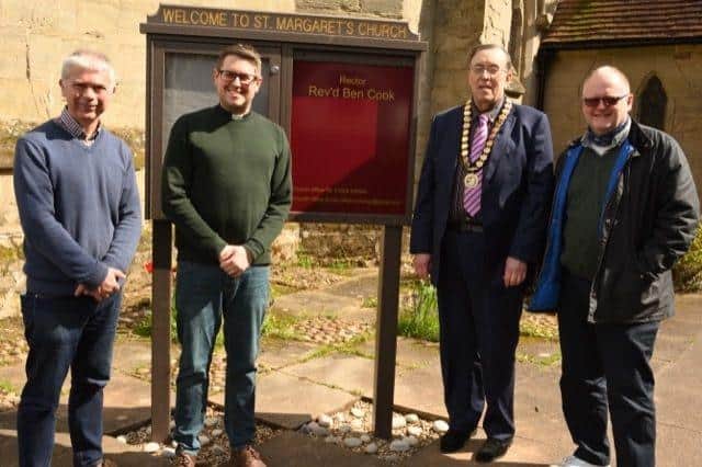 Churchwardens Simon Greaves and Adrian Barton standing each side of Rev Ben Cook and Whitnash Mayor, Barry Franklin.