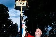 Rugby Mayor Simon Ward lights the beacon.