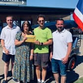 Vickie Morris collecting her golden ticket. From left to right: Nigel Palmer, George Palmer, Vickie Morris, Magic of Thailand’s Daniel Biggs and Steve Gallimore. Photo supplied