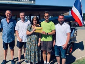 Vickie Morris collecting her golden ticket. From left to right: Nigel Palmer, George Palmer, Vickie Morris, Magic of Thailand’s Daniel Biggs and Steve Gallimore. Photo supplied