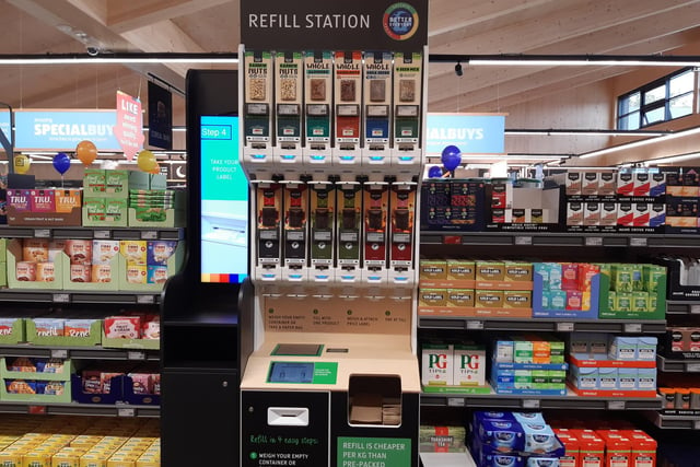 The coffee bean and nuts refill station is a new feature of the store.