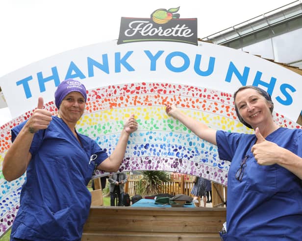 NHS staff at UHCW give a thumbs up to their colleagues to celebrate the NHS birthday