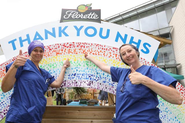 NHS staff at UHCW give a thumbs up to their colleagues to celebrate the NHS birthday