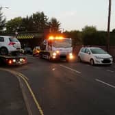 This picture by Bernard Tanner shows three vehicles being recovered.