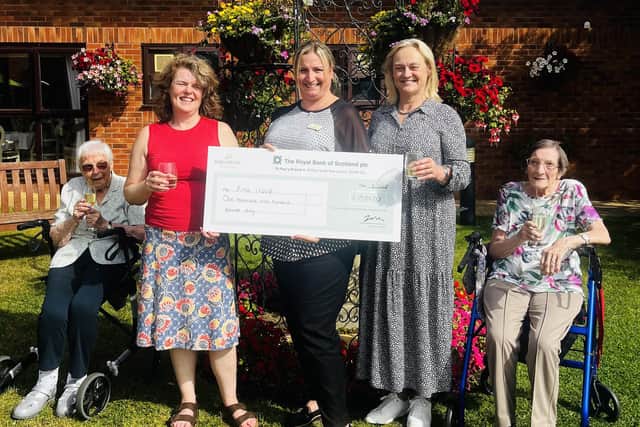 Cubbington Mill owner Barchester's Charitable Foundation has presented a cheque for £1,900 to Art Uplift to support it in bringing its Rewind-1970s show to communities of elderly and vulnerable people. Picture supplied.