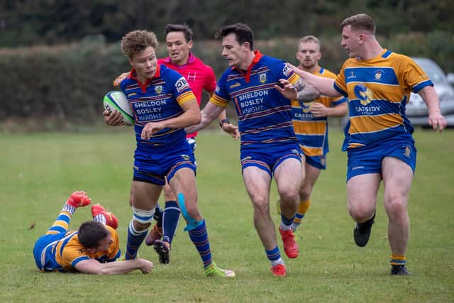 Kofi Miller, backed up by Rich McKowen, on his way to scoring his side's second try of the match. Pic by Ken Pinfold.