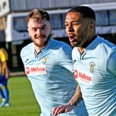 Jordan Wilson celebrates after he came off the bench to open the scoring for Rugby Town in their 2-0 win at Wellingborough Town. Picture by Martin Pulley