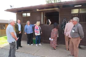 Members of the Warwick Rotary Club recently visited the Riding for the Disabled (RDA) head office and training centre in Shrewley, where they were given a talk and a tour of
the facilities. Photo supplied