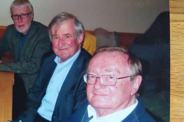 Paul Huband is on the right sitting with reunion colleagues. Picture supplied.