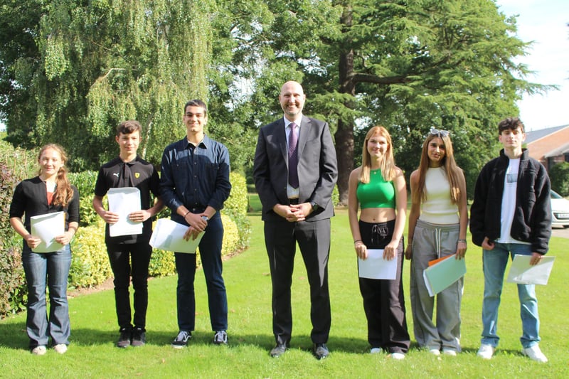 GCSE pupils with Headmaster, Grove du Toit at Princethorpe College this morning. Left to right: Jemima Teeton, Giorgio Kleinmann, Lampros Papadogiannakis, Grove du Toit (Headmaster), Megan Shipton, Mia Samra and Alexander MacRae. Photo by Princethorpe College