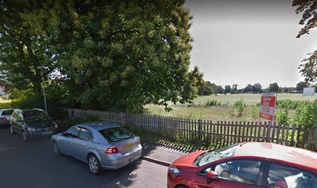 Part of the site KES wants to build on, the edge of its playing fields fronting Manor Road in Stratford. Photo: Google Street View.