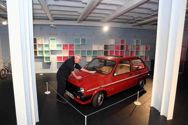 Harry Pearson gives Lady Diana’s 1980 Austin Mini Metro a final clean after it is put on display at Coventry Transport Museum. Picture supplied