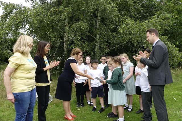 Bee Friendly Kenilworth and Bee Friendly Leamington has been delivering awareness sessions in several schools this year and recently launched a Bee Friendly Schools awards scheme. St John’s School in Kenilworth is the first school to win an award - receiving a silver. The school was presented a certificate and a fruit tree in recognition of their award.  Photo taken by Annie Harper Radley