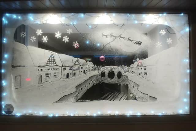 Alvin's mural at The Hair Lounge.