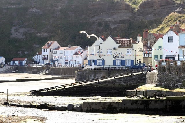 This photogenic fishing village is regarded to be one of the prettiest beaches on the east coast.

With its harbour and sandy beachfront, Staithes is where the North York Moors National Park meets the sea.

It is a popular spot for fossil hunters and geologists who love to discover the history of the area.

The harbour village made an appearance in the CBBC series Old Jack’s Boat, which starred Bernard Cribbins as Old Jack and Salty the dog.

Staithes Beach has a rating of four and a half stars on TripAdvisor with 412 reviews.