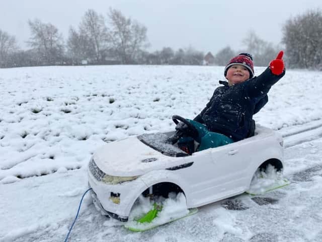 Alfie Pick, aged 4, enjoys a snow day.