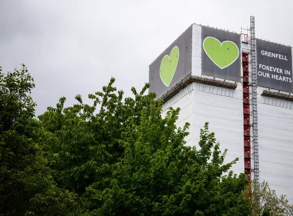 The covered structure of Grenfell Tower in London Photo by Leon Neal/Getty Images