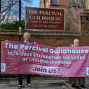 Guildhouse Centenary Committee Chairman, David Dove and Centre Manager Sarah Gall with the banner celebrating 100 years of adult education in Rugby.