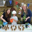 From left, Bellway sales advisor Patricia Aaron, with a pupil from Lighthorne Heath Primary School, and Lighthorne Heath community champion Emma Hills at the school’s summer event supported by Bellway. Photo supplied