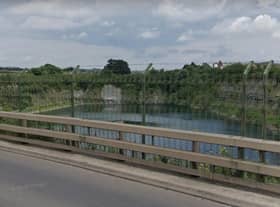 The view from Rugby's Western Relief Road of the quarry Cemex hopes to drain - and then fill with spoil from HS2. Photo: Google Street View.