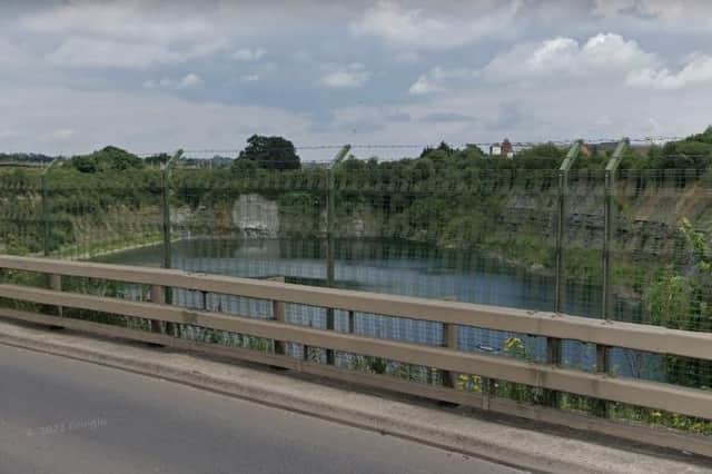The view from Rugby's Western Relief Road of the quarry Cemex hopes to drain - and then fill with spoil from HS2. Photo: Google Street View.