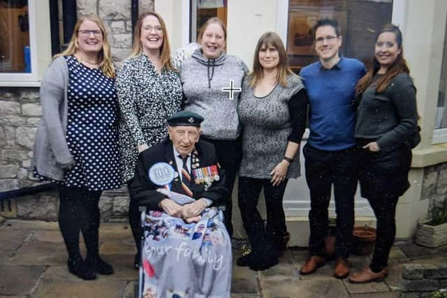 Reg Charles with his grandchildren at a gathering to celebrate his 100th birthday