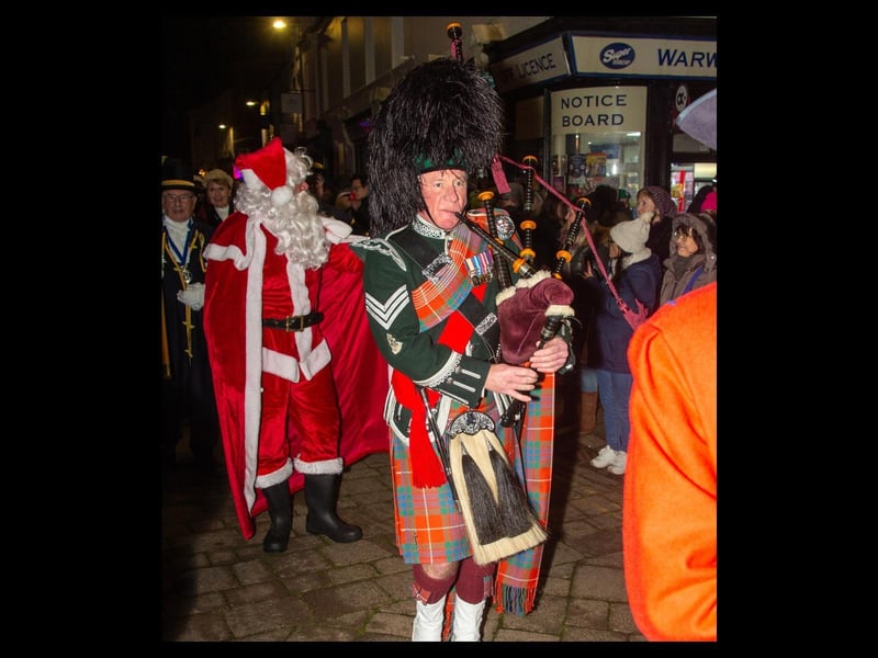 The procession with Father Christmas making its way through the town centre.