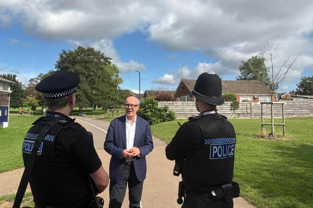 Warwick and Leamington MP Matt Western speaking to police officers in St Nicholas Park in Warwick. Photo by Matt Western