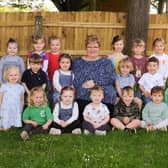The community in Bishop's Tachbrook community is bidding a fond farewell to a much-loved and long-standing member, Zita Lowe, who will be retiring from her position as head at the pre-school nursery next month. Photo shows Zita Lowe with some of the nursery children. Photo supplied by Bishop's Tachbrook Pre-school Nursery