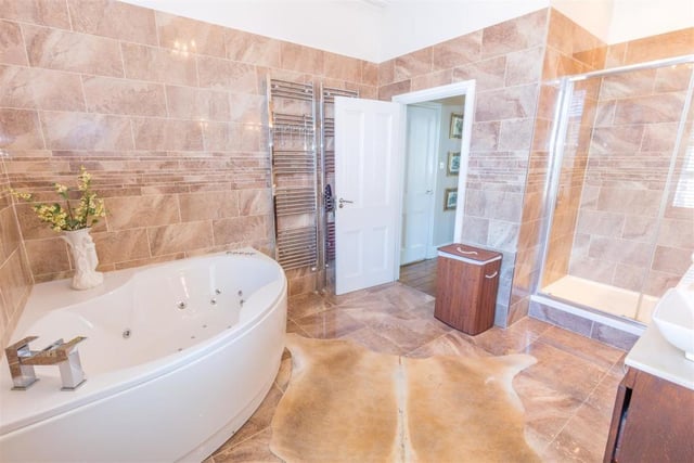 The ensuite bathroom which is connected to the master bedroom. Photo by Fine and Country