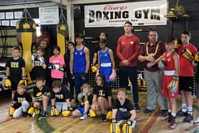 Cleary's Boxing Gym boxers including Birmingham 2022 Commonwealth Games gold medallist Lewis Williams (in red) with Leamington Mayor Cllr Nick Wilkins.