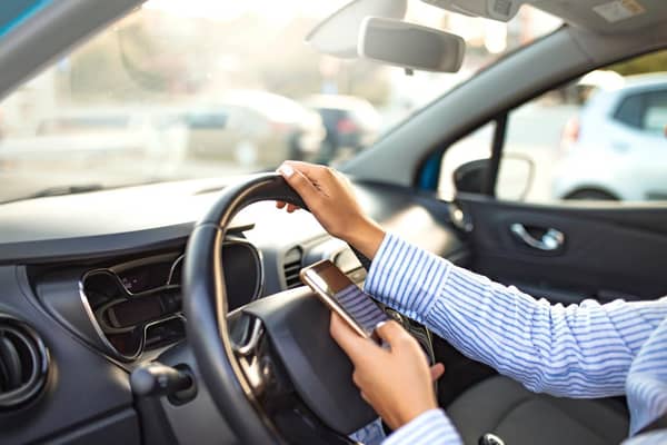 You should avoid doing these things on your phone while driving - or face a fine or points on your licence. 