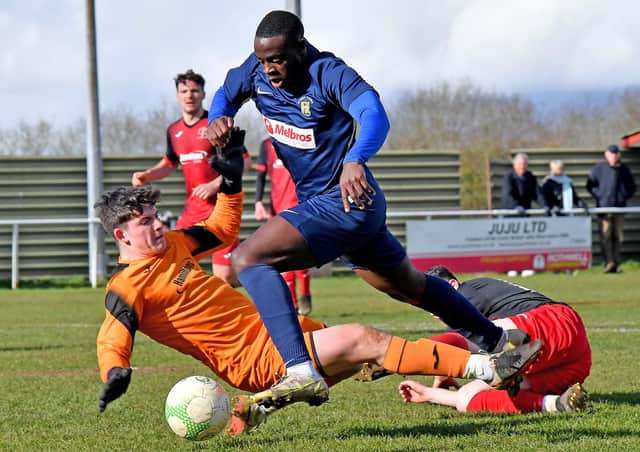 Madundo Semahimbo should have won a penalty against Rothwell Corinthians  PICTURES BY MARTIN PULLEY