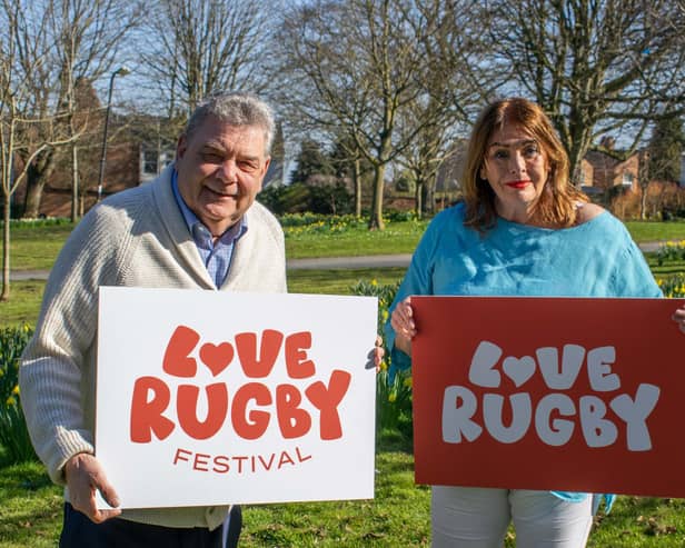 Cllr Neil Sandison and Cllr Maggie O'Rourke celebrate the launch of the Love Rugby Festival with the new Love Rugby and Love Rugby Festival logos.